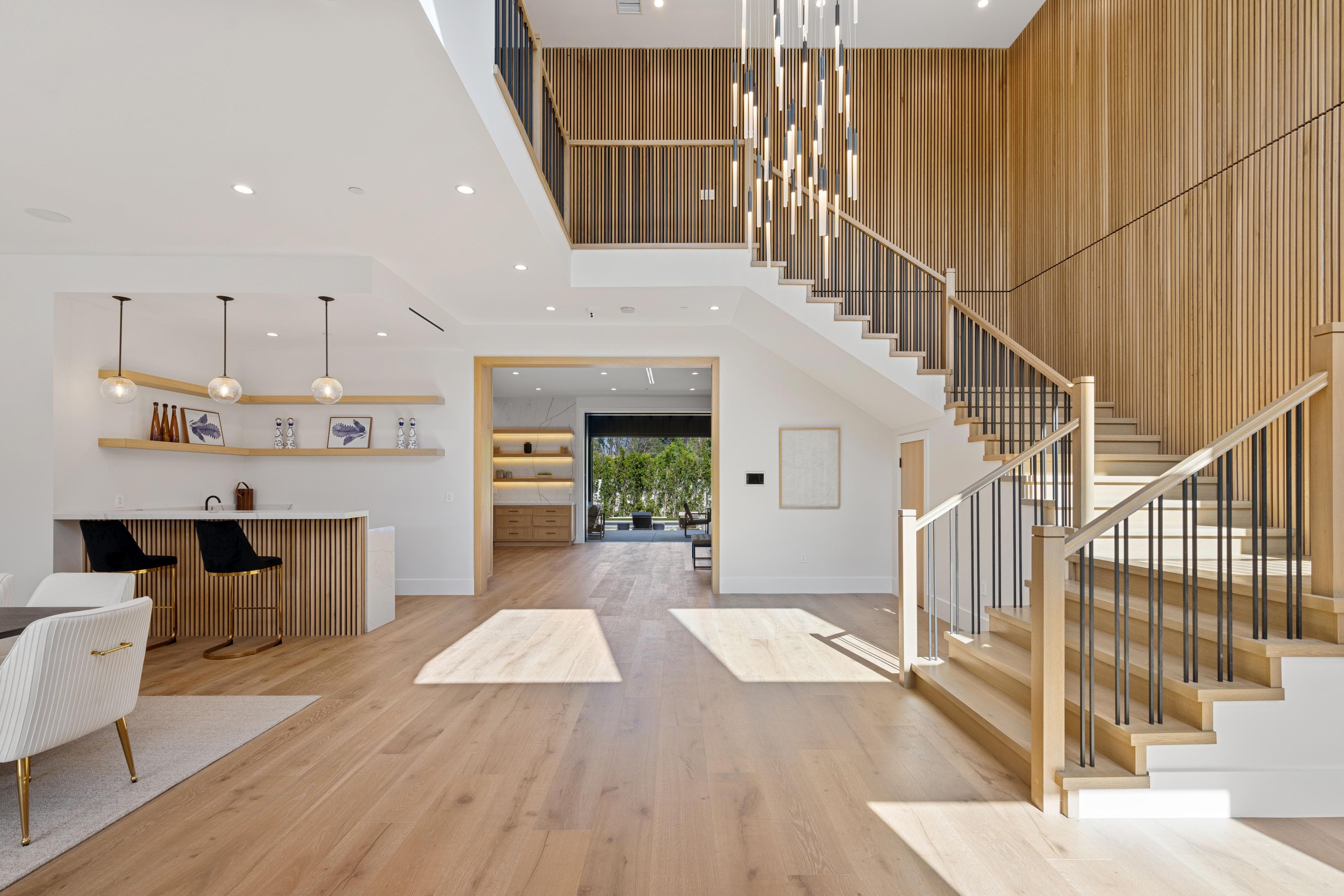 Warm, open-concept living space with wooden accents — a rental-ready interior
